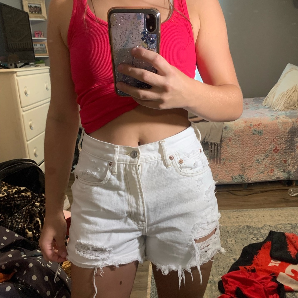 White distressed American Eagle shorts